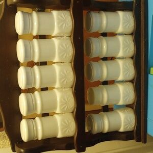 Genuine Ma Lek wood rack with mik glass species containers.